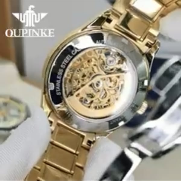 Đồng hồ oupinke 3168 Gold mới -  1